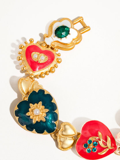 Pulsera Elysian de oro de 18 quilates con diseño bohemio barroco y corazón