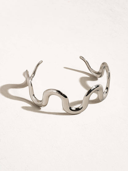 Pulsera con declaración ondulada